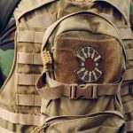 military-backpack-with-a-patch-stitched-on-the-out-2021-09-03-05-42-00-utc